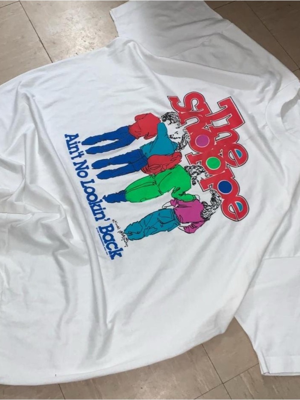 White Graphic Kids Tee with Colorful Crew Illustration.With colorful text.